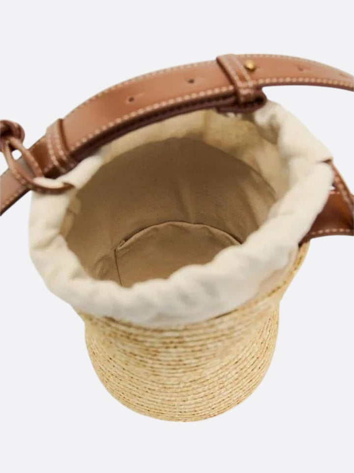 Brown straw and leather bag